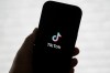 A TikTok logo is shown on a phone in San Francisco, Friday, Jan. 17, 2025. (AP Photo/Jeff Chiu)