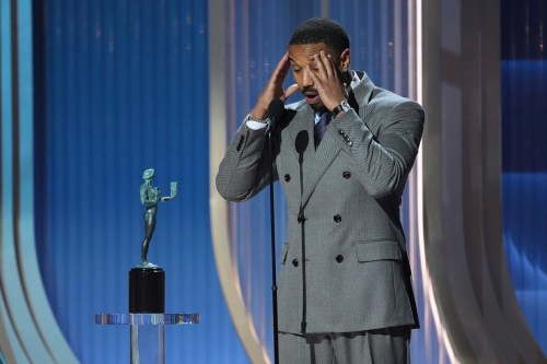 FILE - Michael B. Jordan reacts as he accepts the award for outstanding performance by a male actor in a leading role for 
