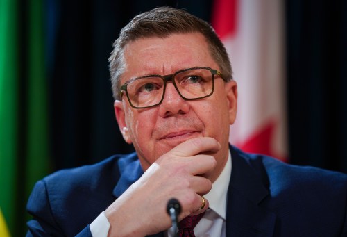 Saskatchewan Premier Scott Moe looks on during a press conference before the release of provincial Saskatchewan budget in Regina, on Wednesday, March 18, 2026. THE CANADIAN PRESS/Heywood Yu