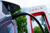 An electric vehicle is charged at a Tesla charging station in Ottawa on Wednesday, July 13, 2022. THE CANADIAN PRESS/Sean Kilpatrick
