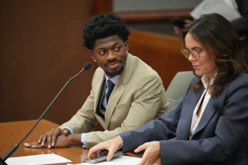 FILE - Lil Nas X, whose legal name is Montero Lamar Hill, appears in court charged with four felony counts, including three counts of battery with injury on a police officer in Los Angeles on March 12, 2026. (Daniel Cole/Pool Photo via AP, File)