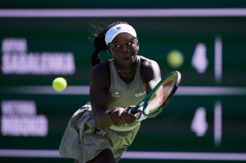 Victoria Mboko, of Canada, returns a shot against Aryna Sabalenka, of Belarus, during a quarterfinal match at the BNP Paribas Open tennis tournament, Thursday, March 12, 2026, in Indian Wells, Calif. (AP Photo/Mark J. Terrill)