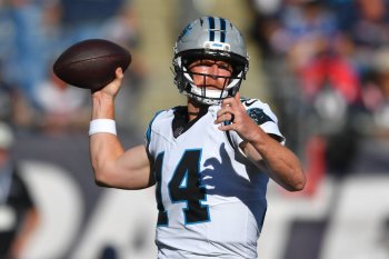 FILE - Carolina Panthers quarterback Andy Dalton. looks to throw a pass against the New England Patriots during the second half of an NFL football game, Sunday, Sept. 28, 2025, in Foxborough, Mass. (AP Photo/Steven Senne, File)