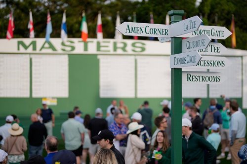 Patrons arrive for a practice at the Masters golf tournament at the Augusta National Golf Club, Monday, April 6, 2026, in Augusta, Ga. (AP Photo/David J. Phillip)