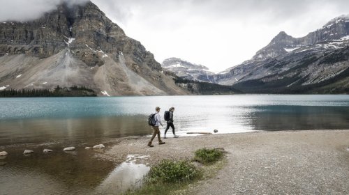 Tourists walk around Bow Lake near Bow Glacier Falls, north of Lake Louise, Alta., in Banff National Park on Friday, June 20, 2025. Restrictions have been placed on water activities after the detection of whirling disease in fish. THE CANADIAN PRESS/Jeff McIntosh