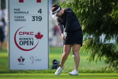 Brigitte Kim Thibault, of Canada, hits her tee shot on the 14th hole during the second round at the LPGA CPKC Canadian Women's Open golf tournament, in Vancouver, on Friday, August 25, 2023. THE CANADIAN PRESS/Darryl Dyck