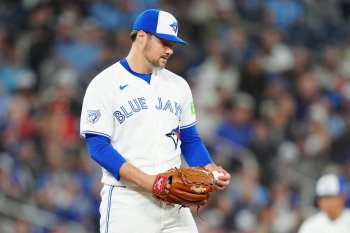 Toronto Blue Jays pitcher Brendon Little (54) reacts after giving up a grand slam in the seventh inning MLB baseball action against the Athletics in Toronto on Saturday, March 28, 2026. THE CANADIAN PRESS/Frank Gunn