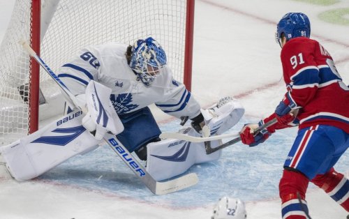 Montreal Canadiens' Oliver Kapanen (91) scores on Toronto Maple Leafs goaltender Joseph Woll (60) during first period NHL hockey action in Montreal on Tuesday, March 10, 2026. THE CANADIAN PRESS/Christinne Muschi