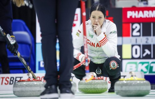 Team Canada skip Kerri Einarson contemplates her rocks during play against Sweden at the World Women’s Curling Championship in Calgary, Saturday, March 14, 2026. THE CANADIAN PRESS/Jeff McIntosh