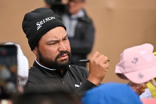 J.J. Spaun signs autographs after the fourth round of the Valero Texas Open golf tournament in San Antonio, Sunday, April 5, 2026. (AP Photo/Darren Abate)