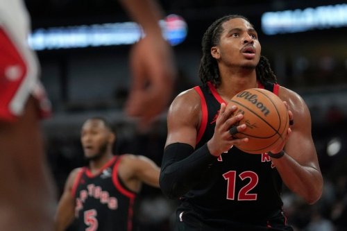 Toronto Raptors forward Collin Murray-Boyles (12) prepares to take a free throw during the second half of an NBA basketball game against the Chicago Bulls, Thursday, Feb. 19, 2026, in Chicago. (AP Photo/Erin Hooley)