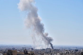 A plume of smoke rises after a strike in Tehran, Iran, on Sunday. Donald Trump and his administration should consider that it is generally a bad idea to start a war unless you have a plan.(The Associated Press)