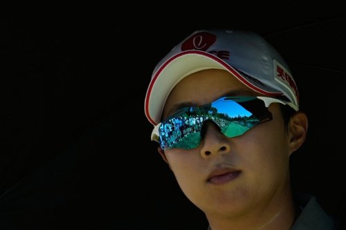 Spectators are seen reflected on the sunglasses of Hyo Joo Kim, of South Korea, before she hits from the third tee during the final round of the LPGA Fortinet Founders Cup golf tournament, Sunday, March 22, 2026, in Menlo Park, Calif. (AP Photo/Godofredo A. Vásquez)