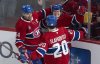 Montreal Canadiens' Cole Caufield (13) celebrates his goal with teammates Nick Suzuki (14) and Juraj Slafkovsky (20) during second period NHL hockey action against the Anaheim Ducks, in Montreal on Sunday, March 15, 2026. THE CANADIAN PRESS/Christinne Muschi