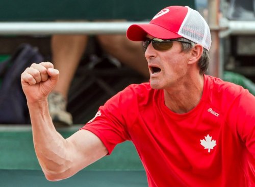 Canada captain Martin Laurendeau watches the Davis Cup World Group quarterfinal match between Belgium's Steve Darcis and Canada's Frank Dancevic in Middelkerke, Belgium, on July 17, 2015. (AP Photo/Geert Vanden Wijngaert)