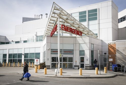 A person walks past the emergency department of the Rockyview General Hospital in Calgary, Thursday, March 20, 2025.THE CANADIAN PRESS/Jeff McIntosh
