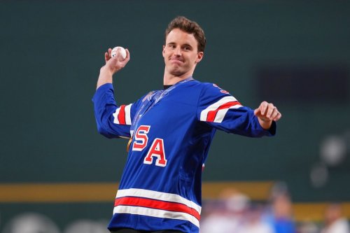 Dallas Stars goaltender Jake Oettinger throws a ceremonial first pitch prior to the Texas Rangers' home-opener baseball game against the Cincinnati Reds, Friday, April 3, 2026, in Arlington, Texas. (AP Photo/Julio Cortez)