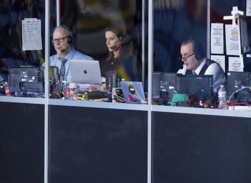 Former curling great Russ Howard, left, Vic Rauter, right, and Olympic curling silver medallist Cheryl Bernard, the TSN team at the Scotties Tournament of Hearts, call the action from the broadcast booth at Centre 200 in Sydney, N.S. on Tuesday, Feb. 19, 2019. THE CANADIAN PRESS/Andrew Vaughan