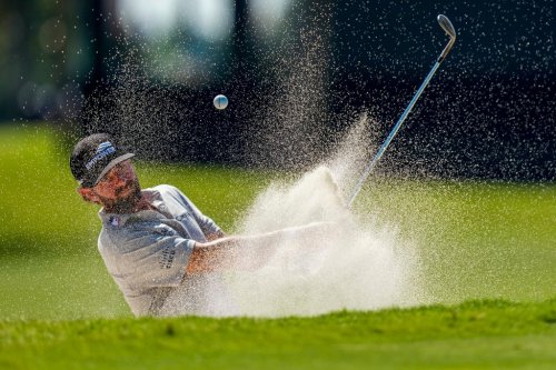 Cameron Young hits from the bunker on the eighth green during the second round of the Cadillac Championship PGA golf tournament Friday, May 1, 2026, in Doral, Fla. (AP Photo/David J. Phillip)