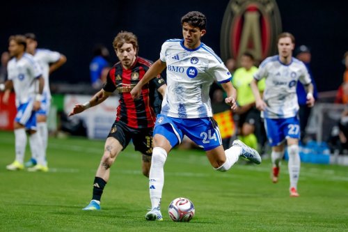 CF Montreal defender Efrain Morales (24) controls the ball against Atlanta United forward Saba Lobjanidze, centre left, during the first half of an MLS soccer match, Saturday, May 2, 2026, in Atlanta. (AP Photo/Erik S. Lesser)