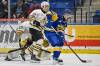 Brandon Wheat Kings defenceman Nigel Boehm (12) keeps an eye on Saskatoon Blades forward Cooper Williams (16) in front of goalie Filip Ruzicka during Western Hockey League action at SaskTel Centre on March 18. The defenceman is from nearby Corman Park. (Rick Elvin/Saskatoon Blades)
                                March 18, 2026