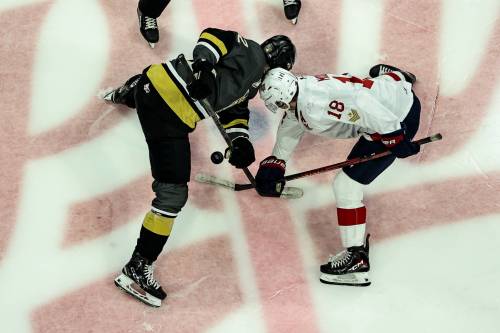 Brandon Wheat Kings centre Nick Johnson (62) battles Regina Pats centre Zach Moore (18) in a faceoff at centre-ice during Western Hockey League action at Brandt Centre on March 20. Johnson moved to centre to help the club in an area where it lacked options this season. (Keith Hershmiller Photography) March 20, 2026