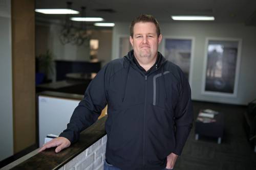 Evan Keller, president of Keller Developments, is shown at the company&rsquo;s office on Middleton Avenue in Brandon on Friday. Keller said the proposed new development charges, on top of increased property taxes and Canada Mortgage and Housing Corporation premiums, are making the local housing market &ldquo;very unattractive.&rdquo; (Tim Smith/The Brandon Sun)