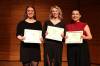 Forty-ninth Eckhardt-Gramatté National Music Competition first-place winners Aemilia Moser (centre) pose for a picture with second-place Kendra Dyck (left) and third-place Camille Labonté (right) after the competition in the Lorne Watson Recital Hall at Brandon University on Sunday afternoon. (Abiola Odutola/The Brandon Sun)