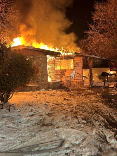 A Rossburn home in flames early Saturday morning. (Supplied)