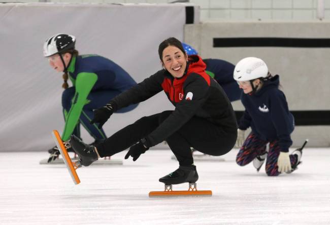 Five-time Canadian Olympian Valerie Maltais shows a training technique during a drill to members of the Westman Speed Skating Club at the Sportsplex on Tuesday. Maltais and her fellow Olympian Anders Johnson visited classrooms and then had activities with the team in the evening that were sponsored by Speed Skating Canada. The visit was part of the prize after the club was named the winner of the Intact Insurance Club Excellence Award last October. (Perry Bergson/The Brandon Sun)