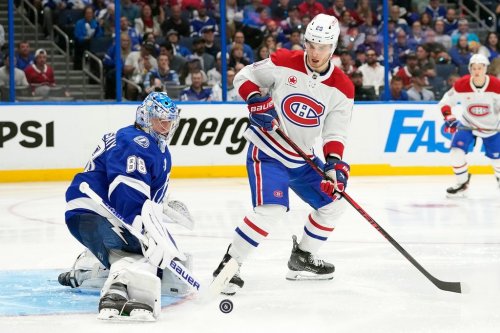 Tampa Bay Lightning goaltender Andrei Vasilevskiy (88) stops a shot by Montreal Canadiens left wing Juraj Slafkovsky (20) during the third period in Game 2, Tuesday, April 21, 2026, in Tampa, Fla. (AP Photo/Chris O'Meara)