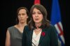 Alberta Premier Danielle Smith speaks about introducing three new bills to do with transgender issues as Tiffany Gillis watches in Edmonton, on Thursday October 31, 2024.THE CANADIAN PRESS/Jason Franson