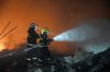 In this photo released by Xinhua News Agency, firefighters work to out the fire after an explosion at a fireworks plant in Guandu Town of Liuyang, central China's Hunan Province, in the early hours of May 5, 2026. (Chen Sihan/Xinhua via AP)