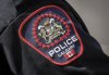 The shoulder patch of a Calgary Police Service officer is pictured in Calgary, Alta., Friday, July 4, 2025.THE CANADIAN PRESS/Jeff McIntosh