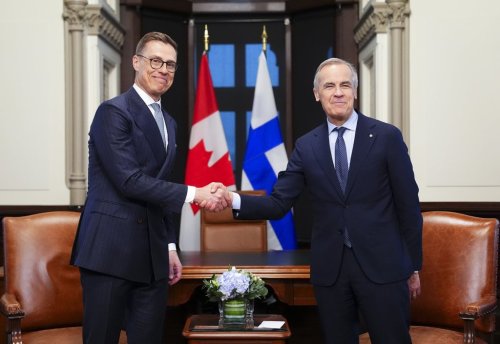 Alexander Stubb, President of Finland, left, and Prime Minister Mark Carney shake hands as they meet on Parliament Hill in Ottawa on Tuesday, April 14, 2026. THE CANADIAN PRESS/Sean Kilpatrick