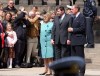 FILE - John Donaldson, center right, father of Mary Donaldson, the fiancée of Denmark’s Crown Prince Frederik, and his wife, Susan Moody, center left, speak to the crowd in front of the Danish Parliament in Copenhagen, May 13, 2004. (AP Photo/Virginia Mayo, File)