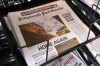 The printed edition of the Pittsburgh Post-Gazette sits in a newspaper rack, Thursday, April 2, 2026, in Pittsburgh. (AP Photo/Gene J. Puskar)
