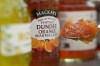 Shop bought varieties orange marmalade are displayed in London, Wednesday, April 15, 2026. (AP Photo/Alastair Grant)