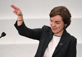 Quebec Premier Christine Frechette gestures toward guests as she arrives to be sworn in at the legislature in Quebec City on Wednesday, April 15, 2026. THE CANADIAN PRESS/Jacques Boissinot
