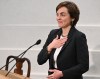 Quebec Premier Christine Frechette puts her hand to her heart after she was sworn in at the legislature in Quebec City on Wednesday, April 15, 2026. THE CANADIAN PRESS/Jacques Boissinot