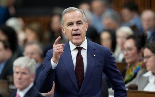 Prime Minister Mark Carney rises during Question Period on Parliament Hill in Ottawa, Wednesday, April 15, 2026. THE CANADIAN PRESS/Adrian Wyld