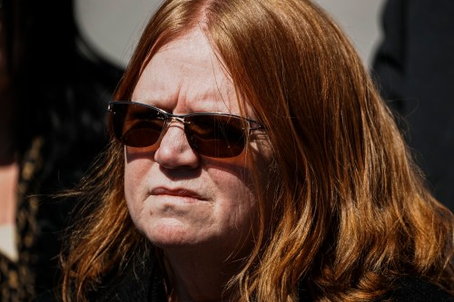 Asa Ellerup, wife, of Rex Heuermann waits to give her statement outside the courthouse as Rex Heuermann, accused in Long Island's infamous Gilgo Beach serial killings, pleaded guilty on Wednesday, April 8, 2026, at Suffolk County Court in Riverhead, New York. (AP Photo/Eduardo Munoz Alvarez)