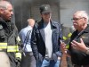 This image provided by Grand Street Media for The Leary Firefighters Foundation shows Leary Firefighters Foundation founder Denis Leary, center, talking with members of the foundation's board of directors, Brian Williams, left, and David Morkal, right, at the 2026 Denis Leary FDNY Firefighter Challenge in New York on May 1, 2026. (Jesse Guma/Grand Street Media for The Leary Firefighters Foundation via AP)