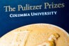 FILE - Signage for The Pulitzer Prizes appear at Columbia University, May 28, 2019, in New York. (AP Photo/Bebeto Matthews, File)