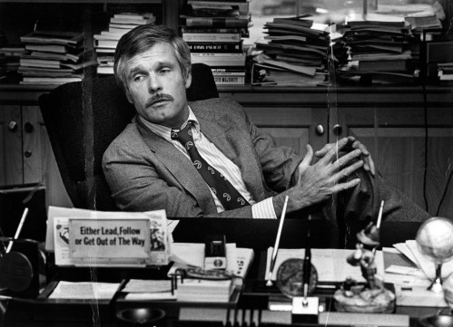 FILE - Ted Turner is seen at his desk inside the CNN Center in 1982. (Nancy Mangiafico/Atlanta Journal-Constitution via AP, File)
