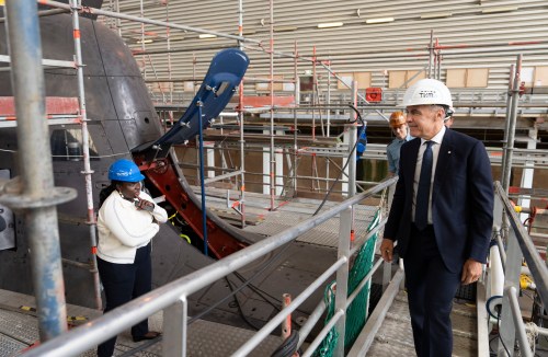 File photo -- Prime Minister Mark Carney looks over a 212A class submarine under maintenance as he tours Thyssenkrupp Marine Systems (TKMS), a submarine building facility in Kiel, Germany on Tuesday, Aug. 26, 2025. THE CANADIAN PRESS/Christinne Muschi