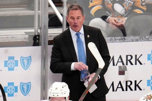 FILE — Vegas Golden Knights head coach Bruce Cassidy stands behind his bench during the third period of an NHL hockey game against the Pittsburgh Penguins in Pittsburgh, on March 1, 2026. (AP Photo/Gene J. Puskar, File)