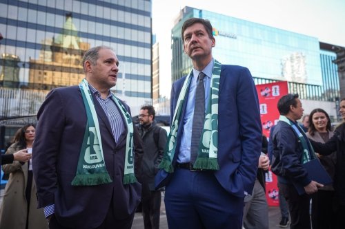 FIFA vice-president and CONCACAF president Victor Montagliani, left, and B.C. Premier David Eby talk during the launch of the FIFA World Cup trophy tour, in Vancouver, on Friday, April 10, 2026. THE CANADIAN PRESS/Darryl Dyck