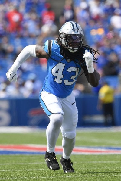 Carolina Panthers linebacker Luiji Vilain (43) runs on the field during the first half of a pre-season NFL football game against the Buffalo Bills in Orchard Park, N.Y., Saturday, Aug. 24, 2024. (AP Photo/Adrian Kraus)