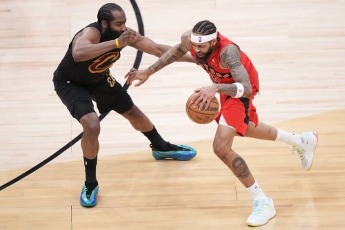 Raptors forward Brandon Ingram (3) tries to get around Cleveland Cavaliers guard James Harden (1) in Toronto on Sunday, April 26, 2026. THE CANADIAN PRESS/Nathan Denette